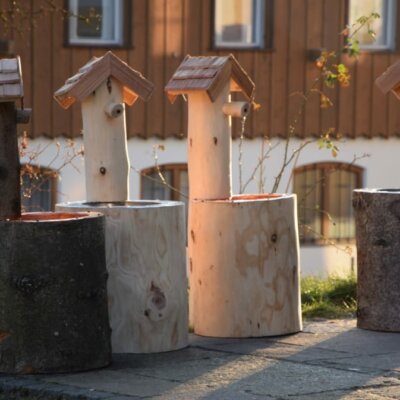 Rundbrunnen im alpinen Stil